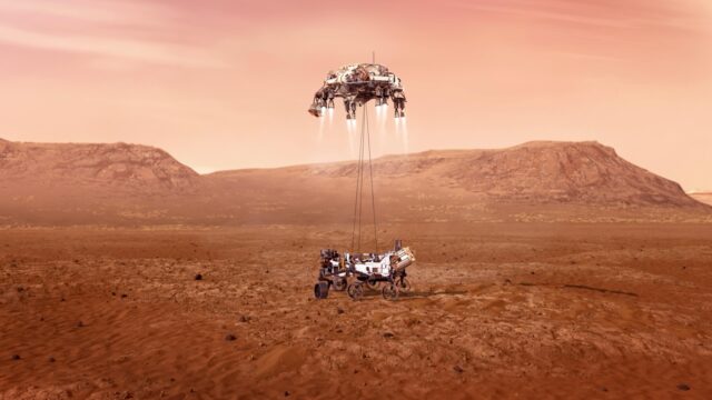 Illustration du rover Perseverance suspendu par câbles sous son étage de descente, quelques instants avant de toucher le sol martien