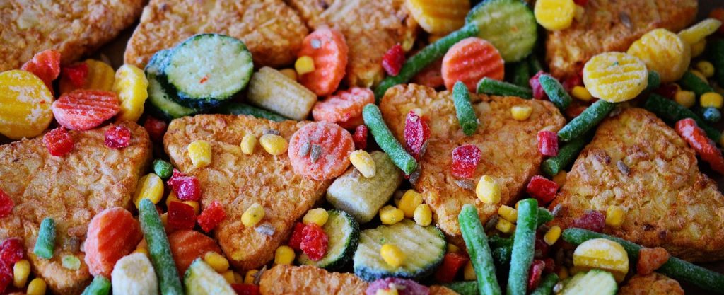 Légumes surgelés conservés au congélateur